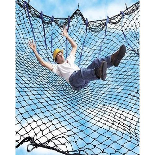 Construction safety net installation on building site